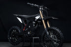Black Delta dirt bike on a dark background