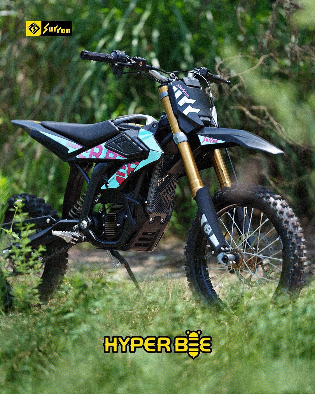 Motorcycle with 'Hyper Bee' branding on a natural background