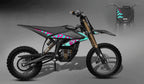 Children's dirt bike with colorful design on a gray background