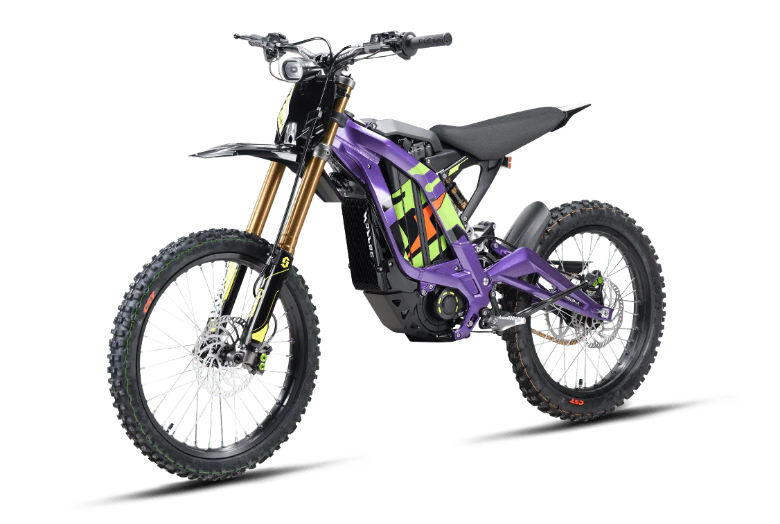 Purple electric bike with black and green accents on a white background
