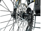 Close-up of a bicycle wheel with disc brake system on a white background