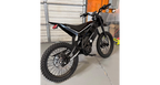 Black electric bike in a garage setting