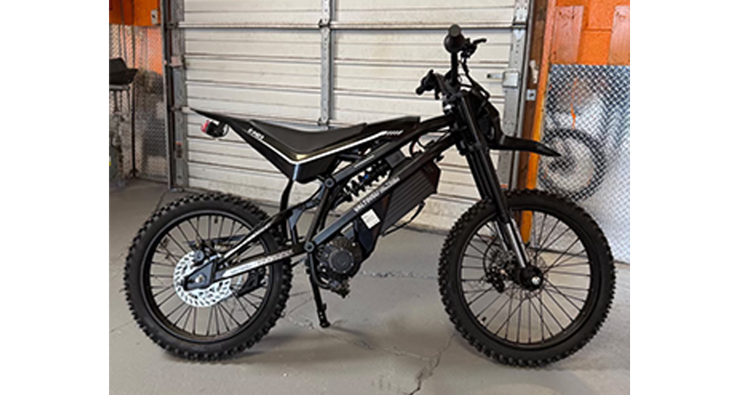 Black electric bike in a garage setting
