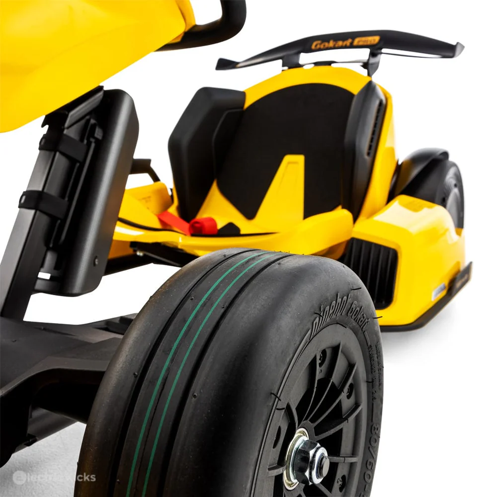 Yellow and black toy car with visible branding on a white background
