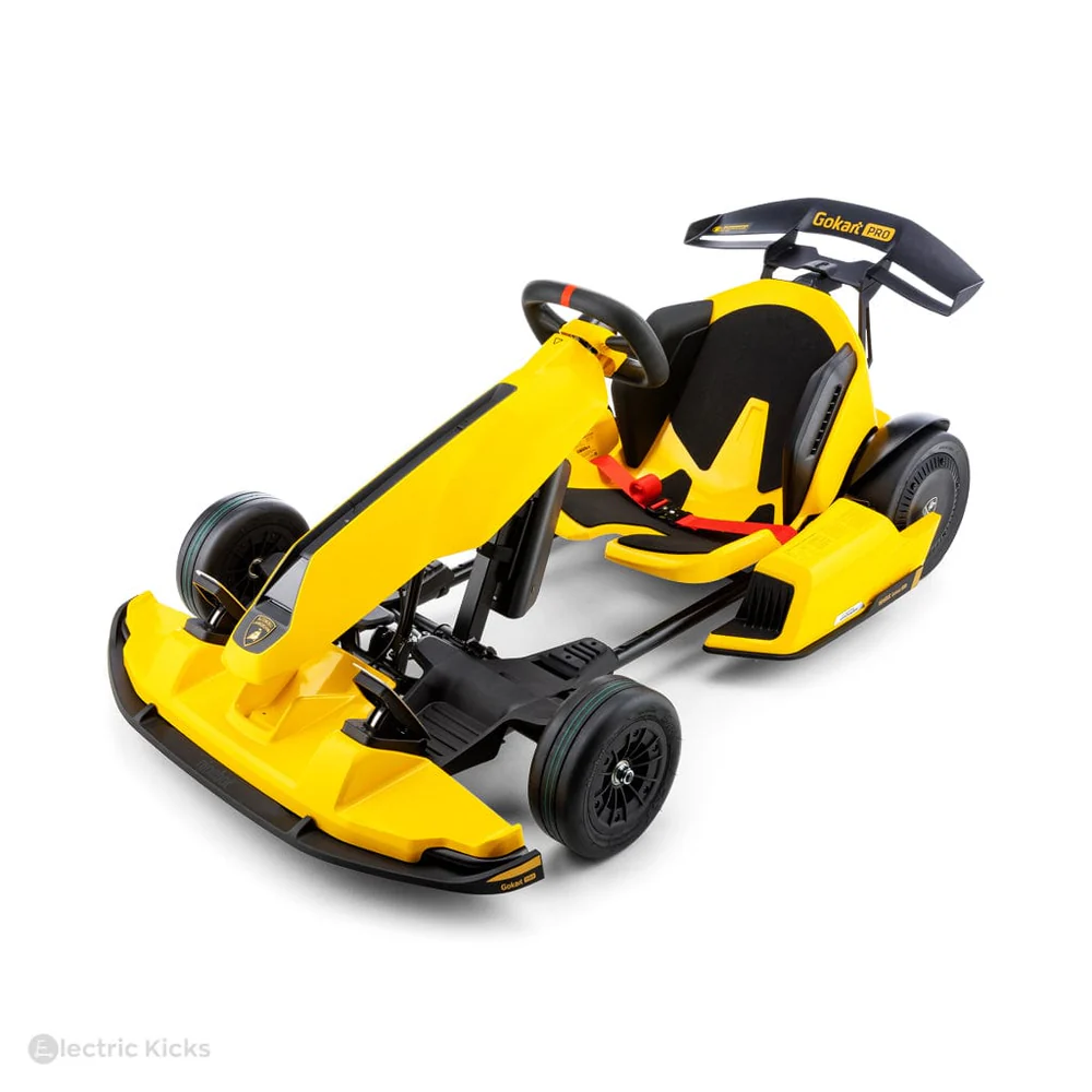 Yellow and black go-kart on a white background