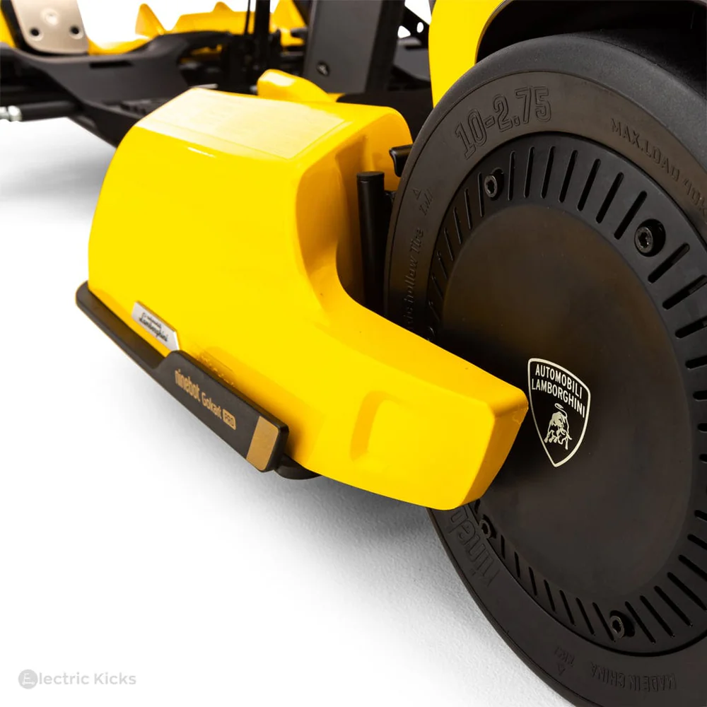 Close-up of a yellow electric scooter wheel with Lamborghini branding on a white background