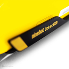 Close-up of a yellow 'ninebot Gokart Pro' product on a white background