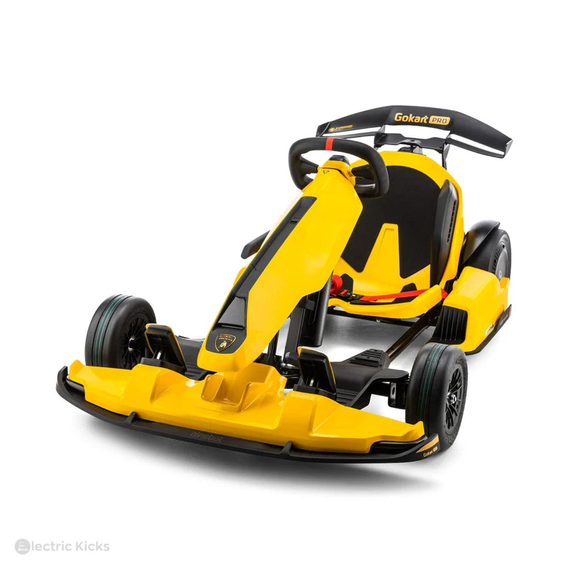 Yellow and black go-kart on a white background
